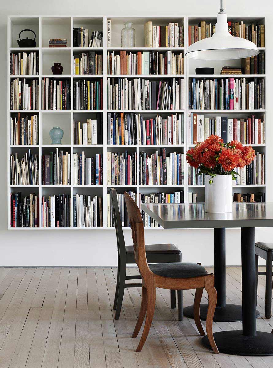 an interior photograph showing a well organized bookshelf