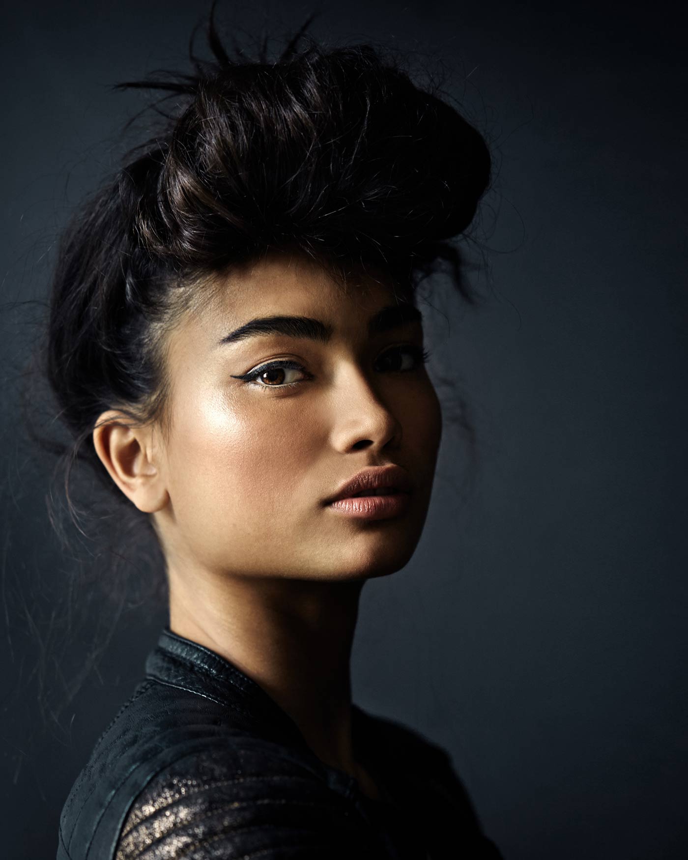 Beauty shot of model showing hair and makeup.