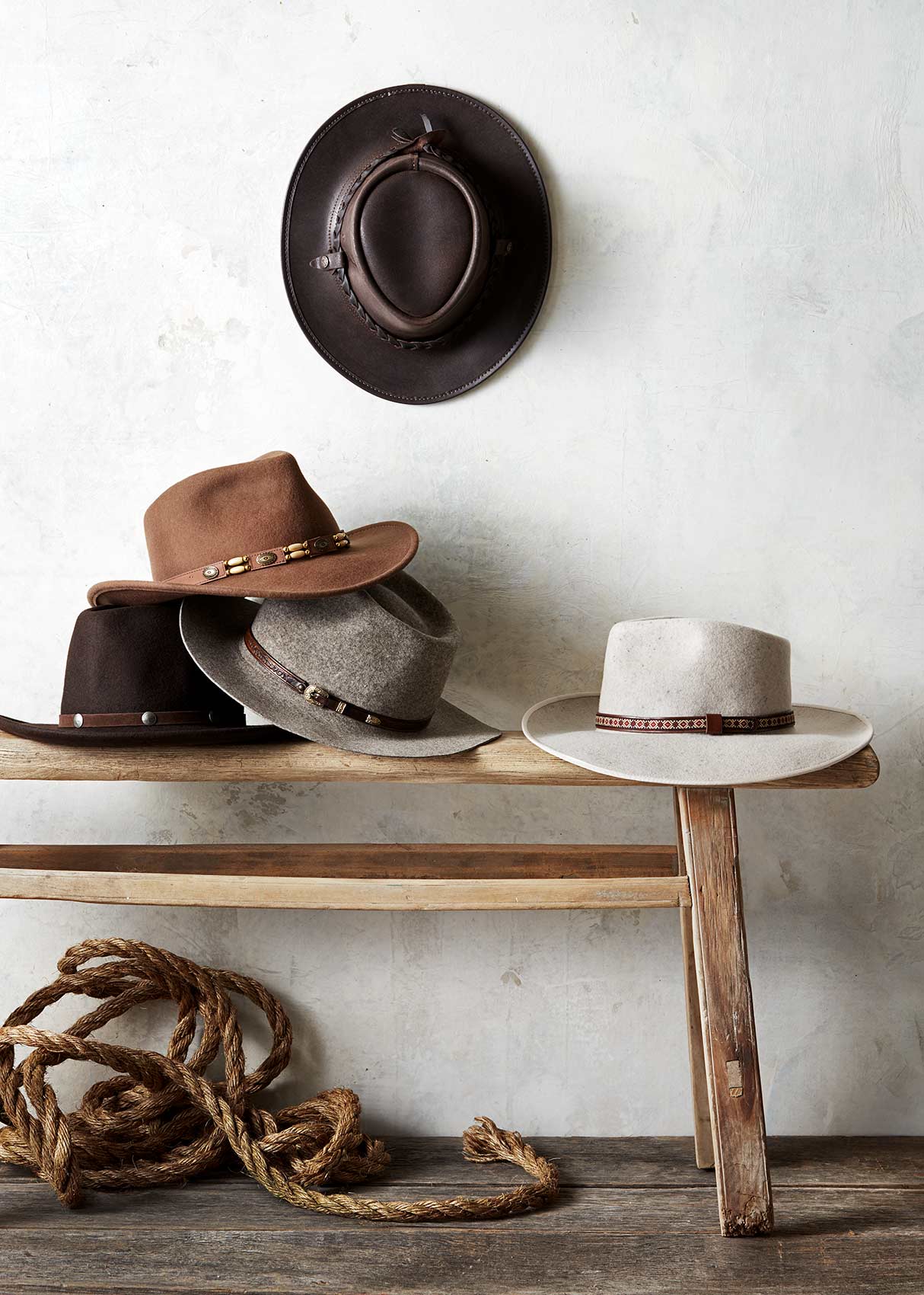 Catalog photography featuring hats and vintage props.