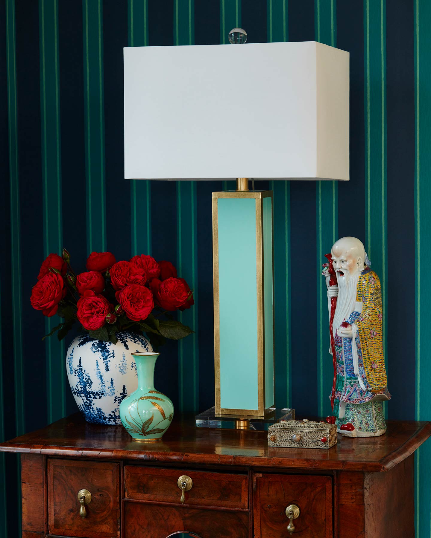 Catalog photograph featuring a colorful lamp in a stylish interior