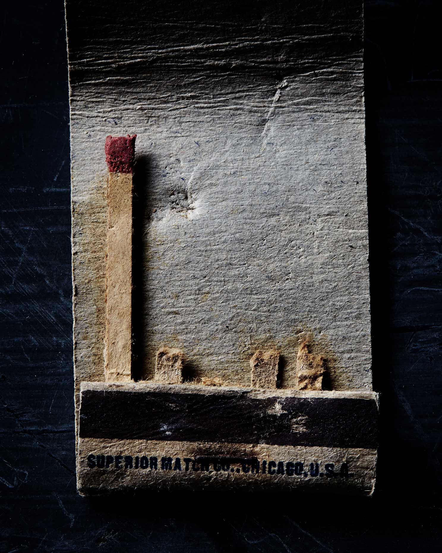 One matchstick left in an old vintage matchbook
